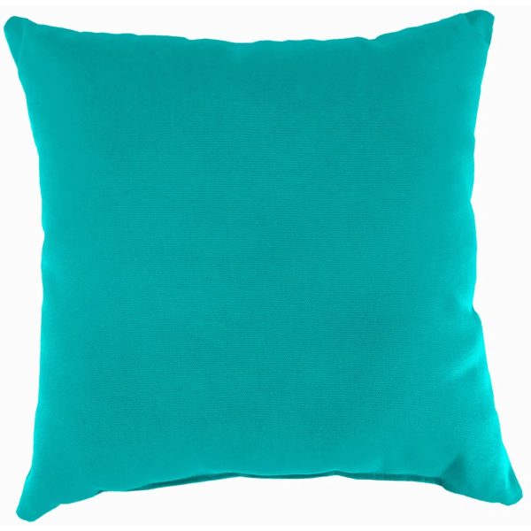 Vibrant aqua decorative pillows styled on a modern patio furniture set by the pool.