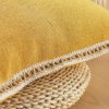 Close-up of the high-quality woven linen fabric and hidden zipper closure.