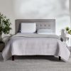 Standard size Sealy Memory Foam pillow on a bed, showcasing the medium height profile.