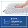 Standard size Sealy Memory Foam pillow on a bed, showcasing the medium height profile.